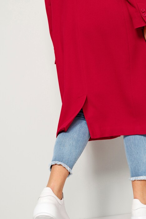 Manteau court en matière texturée, avec revers et manches longues