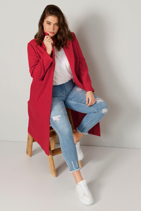Manteau court en matière texturée, avec revers et manches longues