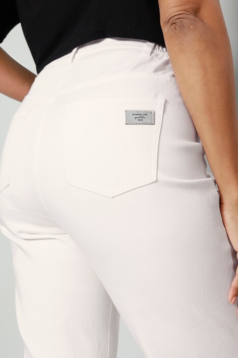 Jean 7/8 coupe Slim Fit à 5 poches, avec broderie ajourée sur l'ourlet