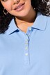 Polo en maille piquée. Patte de boutonnage en velours. Manches courtes