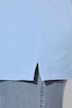 Polo en maille piquée. Patte de boutonnage en velours. Manches courtes