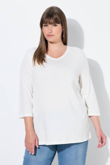 T-shirt, jersey bord-côte. Col en V et manches 3/4. Coton bio