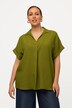 Blouse à manches courtes, boutons dans le dos et pli fantaisie. Coupe oversize.