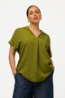 Blouse à manches courtes, boutons dans le dos et pli fantaisie. Coupe oversize.
