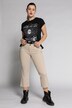 Jeans svasati a 7/8 a cinque tasche con orli sfrangiati