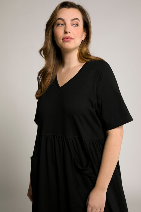 Jersey jurk, zakken, ronde hals, korte mouwen, Empire-jurk