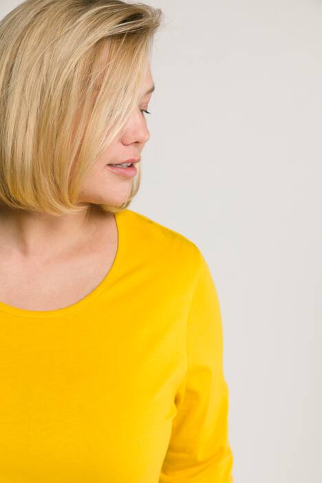 Maglia dal taglio lungo e svasato con scollo rotondo e maniche a 3/4