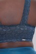 Bralette sans armatures. Fermeture zippée et dentelle