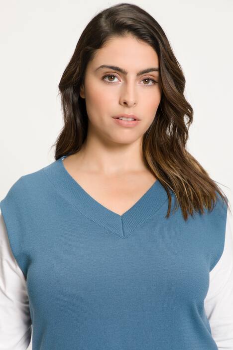 Pull sans manches, profond décolleté en V et fentes sur les côtés