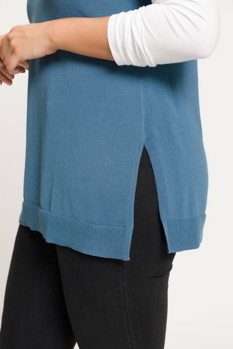 Pull sans manches, profond décolleté en V et fentes sur les côtés