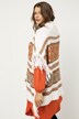 Poncho oversize, motif ethnique, franges