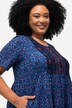 Robe en jersey à col rond et manches courtes, avec couture empire et poches