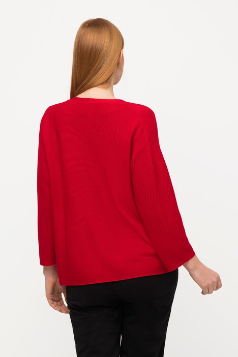 Cardigan oversize, côtes horizontales. Col en V et manches 3/4.