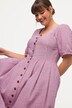 Robe dans un tissu gaufré, carreaux vichy. Col rond et manches courtes.