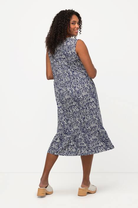 Robe en jersey sans manches. Imprimé, col en V et ligne en A.