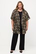Veste kimono à manches courtes. Coupe oversized. Paillettes métallisées.