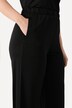 Jupe-culotte en maille fluide. Longueur mollet, jambe large. Taille élastique