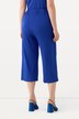 Jupe-culotte en maille fluide. Longueur mollet, jambe large. Taille élastique