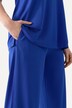 Jupe-culotte en maille fluide. Longueur mollet, jambe large. Taille élastique