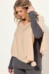 Poncho en maille, finition en pointe, pompon, col en V, sans manches