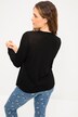 Maglia dal taglio aderente in jersey a costine con scollo a girocollo e maniche lunghe con spacchetto