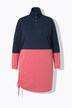 T-shirt long en coton bio. Col montant, manches longues et cordon de serrage.