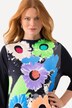 T-shirt long, col montant et manches 3/4. Silhouette en A.