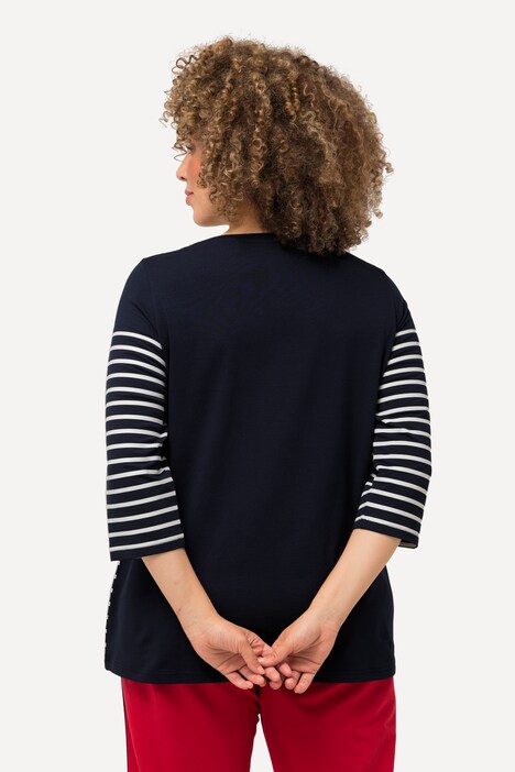 T-shirt rayé, motif méduse. Décolleté bateau et manches 3/4.