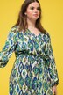 Robe maxi à coupe trapèze, imprimé losanges. Décolleté V et style cache cœur