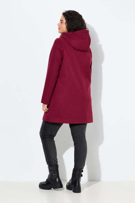 Duffle-coat, coupe évasée. Col montant et capuche. Boutons Brandebourg.