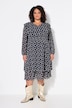 Robe doublée avec ruchés. Décolleté en V et manches longues.