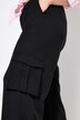 Pantalon cargo taille haute et jambe large, taille partiellement élastique et poches cargo
