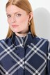 Veste à carreaux avec col montant et pli creux