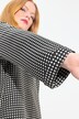 Veste en jacquard, col à revers et fentes sur les côtés, coupe évasée