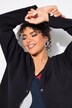 Cardigan en maille double-face. Encolure en V et manches longues