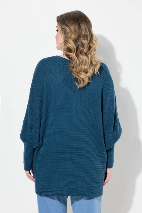 Suéter, look de poncho, escote de pico