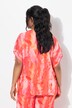 Blouse en mousseline de soie. Motif plume, effet de superposition. Décolleté V et manches courtes
