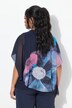 Blouse oversize en mousseline à fleurs. Décolleté rond et manches courtes