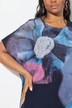 Blouse oversize en mousseline à fleurs. Décolleté rond et manches courtes