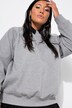 Sweat oversize. Effet pailleté et message imprimé