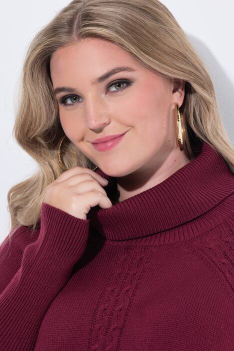 Poncho style cable pattern pointed hem sweater