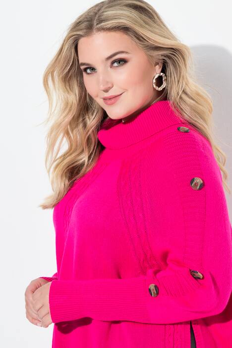 Maglione in stile poncho con intrecci e orlo a punte
