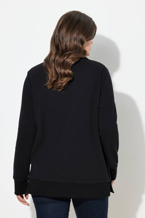 Sweat à col montant. Manches longues. Textile jacquard
