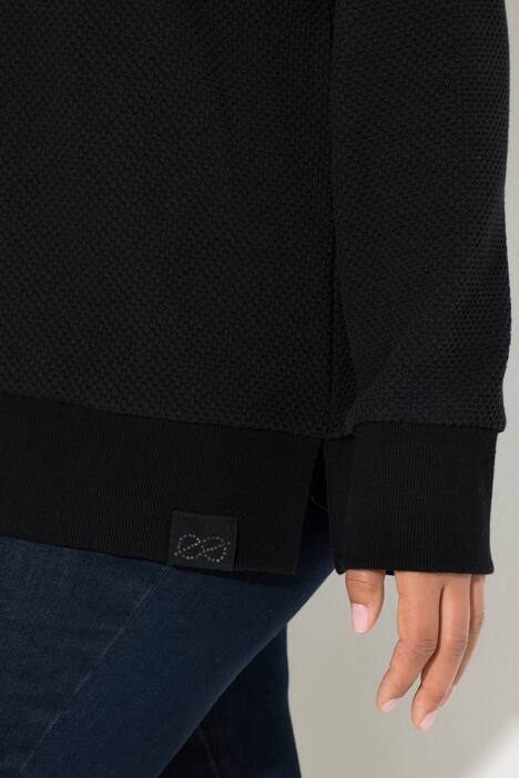 Sweat à col montant. Manches longues. Textile jacquard
