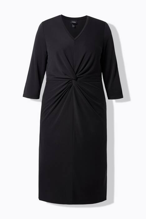 Robe midi avec décolleté en V et manches 3/4. Nœud fantaisie