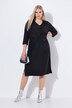 Robe midi avec décolleté en V et manches 3/4. Nœud fantaisie