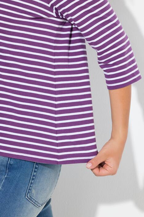 T-shirt rayé. Manches 3/4 et col rond. Coupe Classic