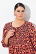 Blouse smockée, imprimé patchwork. Col rond et manches 3/4. Coupe évasée