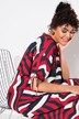 Robe oversize. Décolleté V, manches courtes. Poches