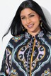 Chemisier oversize. Col classique, manches 3/4. Motif fantaisie